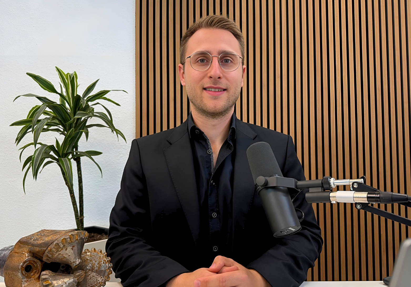 AXINO Capital Partner Jan Willhoeft recording a mining stock interview in studio